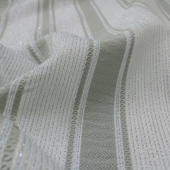 Jacquard in dungi cu fir metalic semi-transparent 