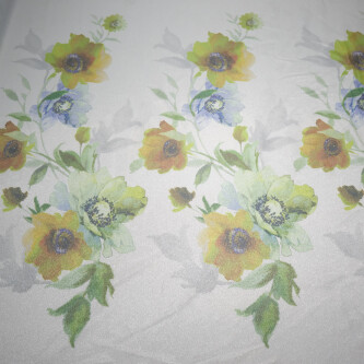 Jacquard transparent cu pelicula metalica si model floral 